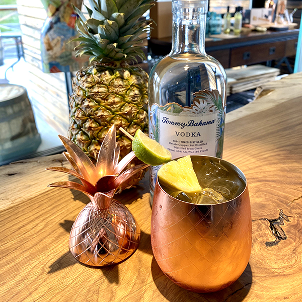2 oz. Tommy Bahama Copper Vodka
1 oz. fresh lime juice
2 oz. pineapple juice
4 oz. Ginger Beer of choice

Fill a shaker with ice and all ingredients. Shake gently once or twice. Pour into a mule mug and garnish with a pineapple and lime slice, and Sip the Island Life!